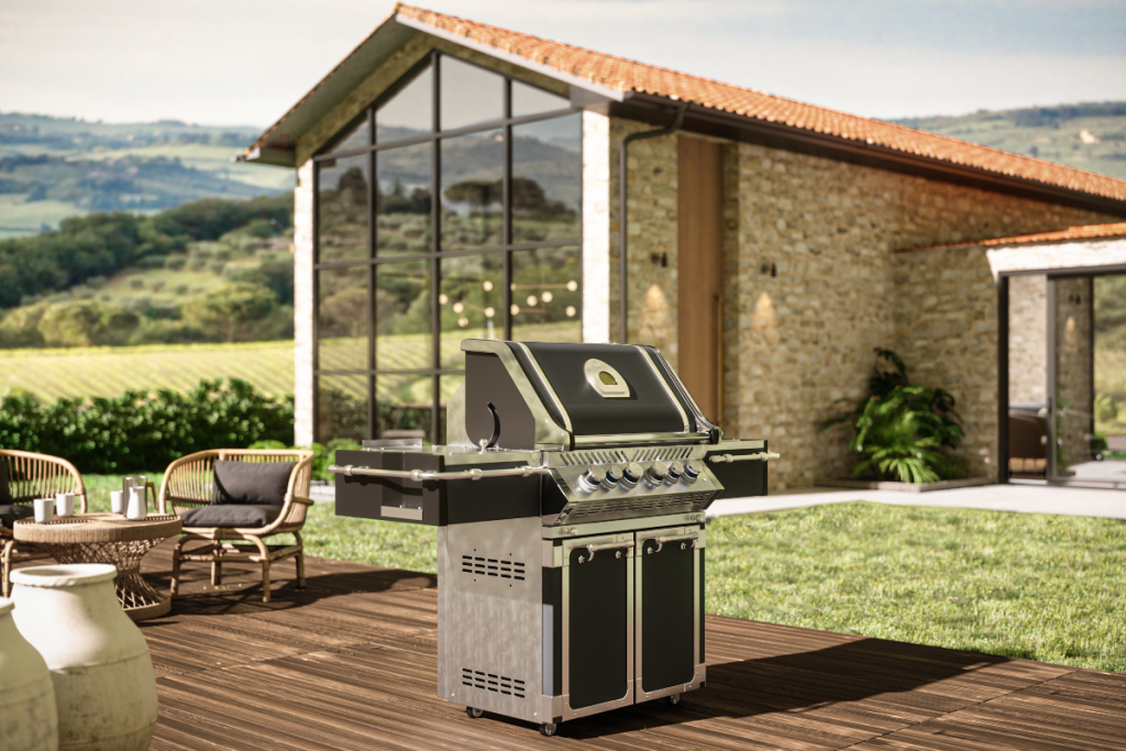 an outdoor kitchen design featuring a stainless steel gas freestanding barbecue on teak decking
