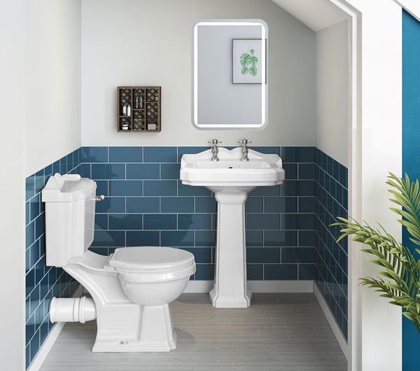 Cloakroom bathroom with blue and white tiles 