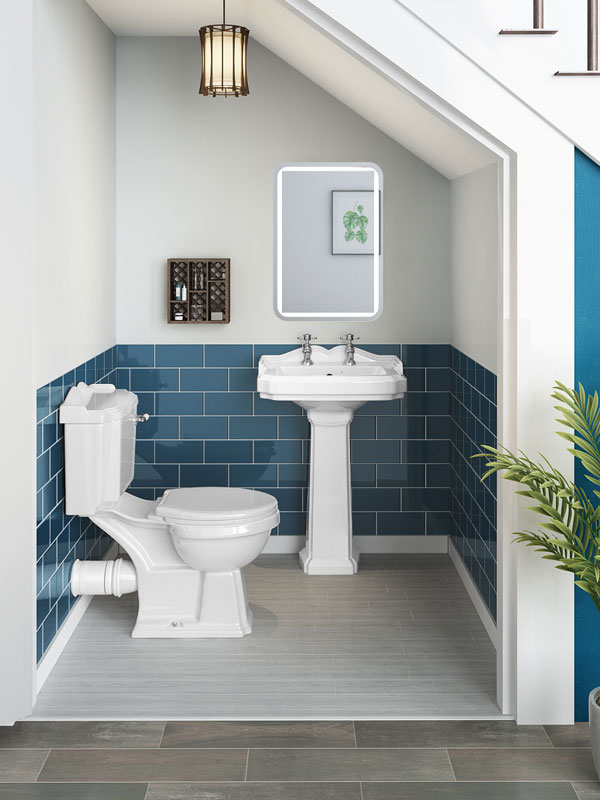 Cloakroom bathroom with blue and white tiles 