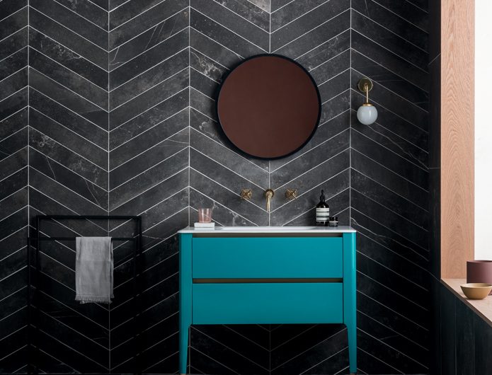 Large-format tiles and a freestanding basin