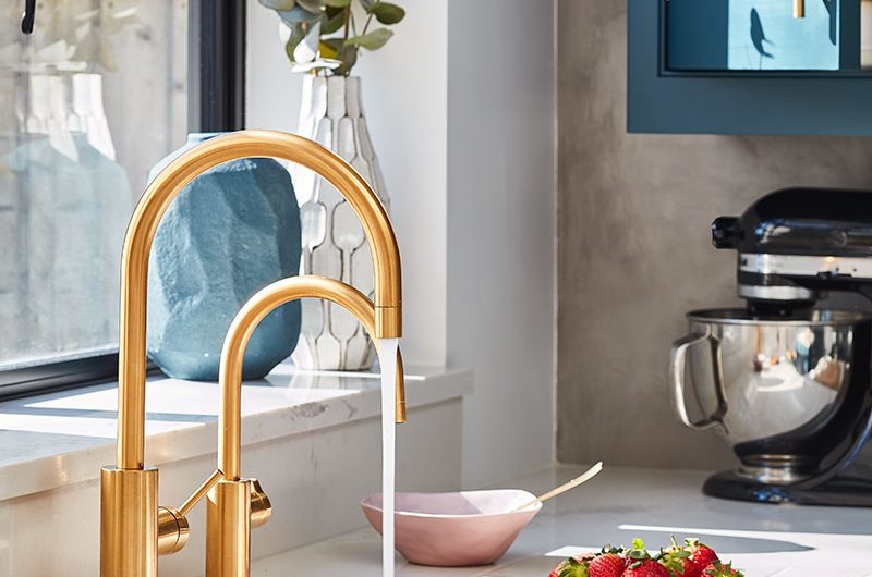 gold taps in the kitchen of Lily Pebbles
