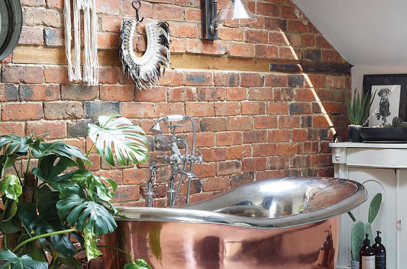 A copper bath in the bedroom