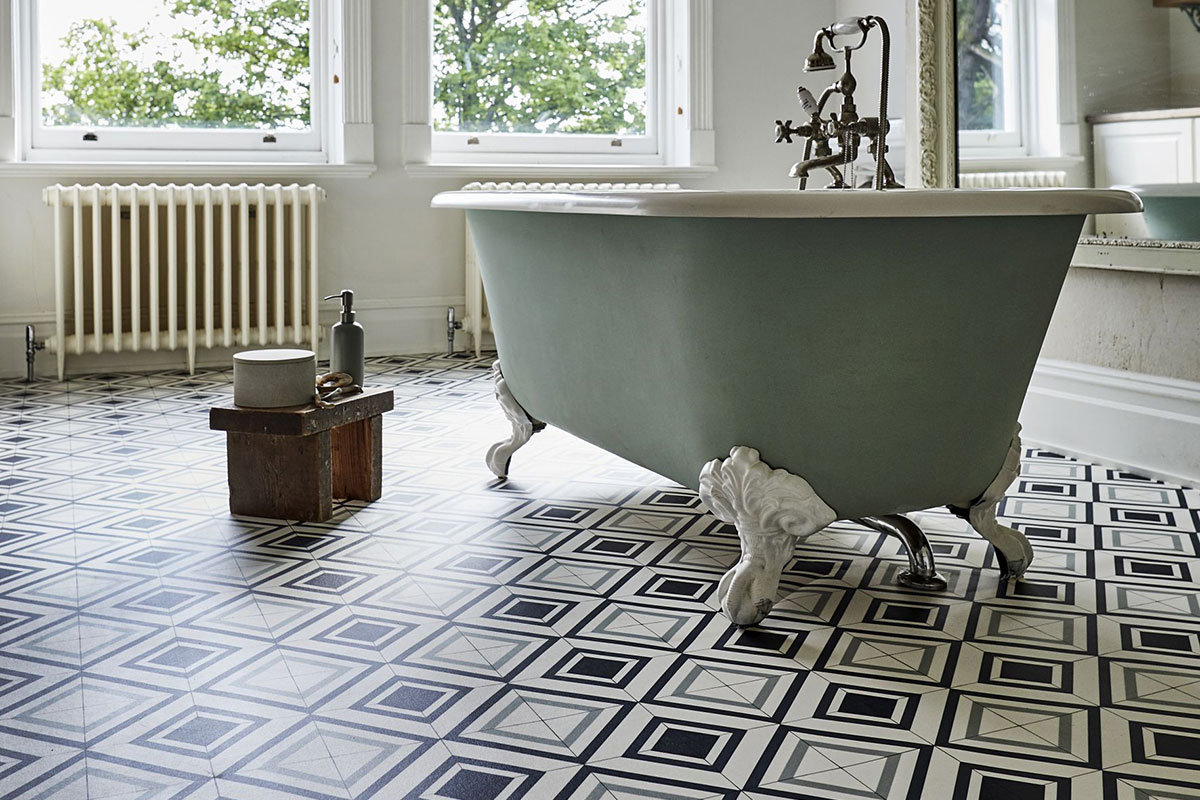 Blue-green freestanding bath on geometric vinyl