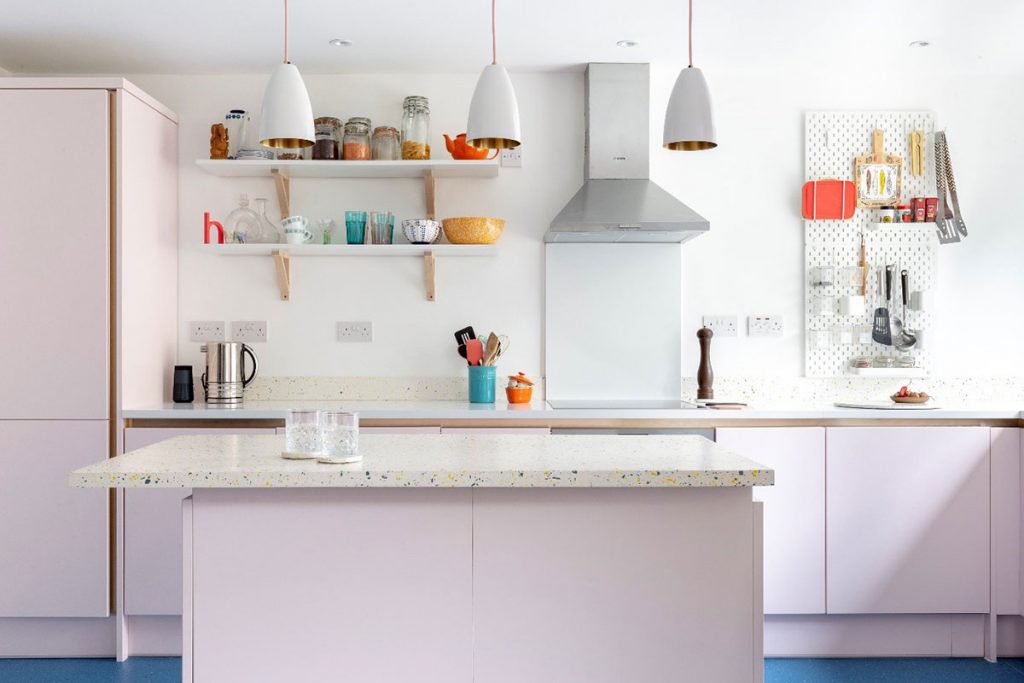 Pastel kitchen in soft pink with white island