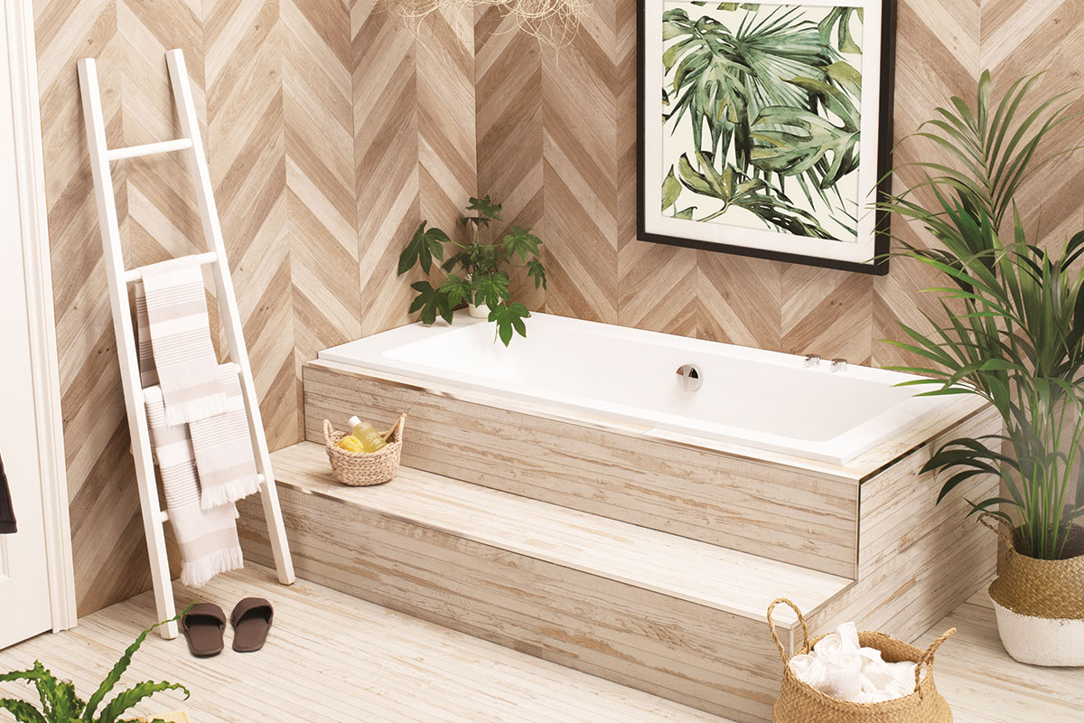 Drop-in bath clad in wood-effect tiles 