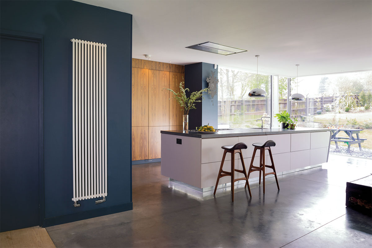 This kitchen features a long radiator