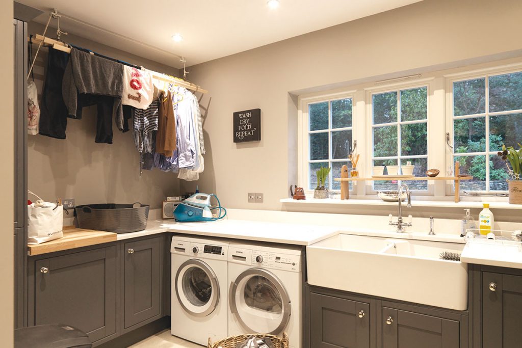 Utility room with large sink and laundry room