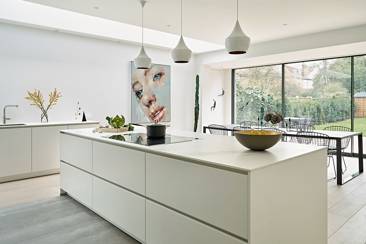 House tour: White kitchen with an island in north London