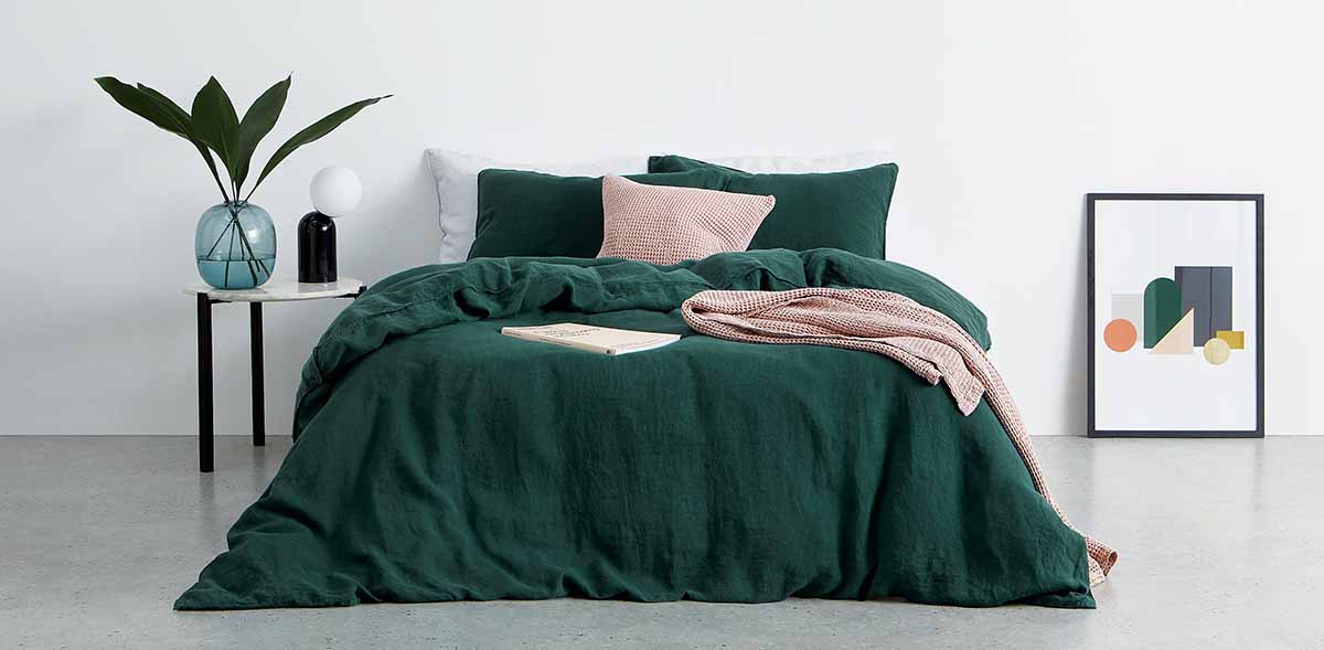 emerald green and dusty pink bedroom