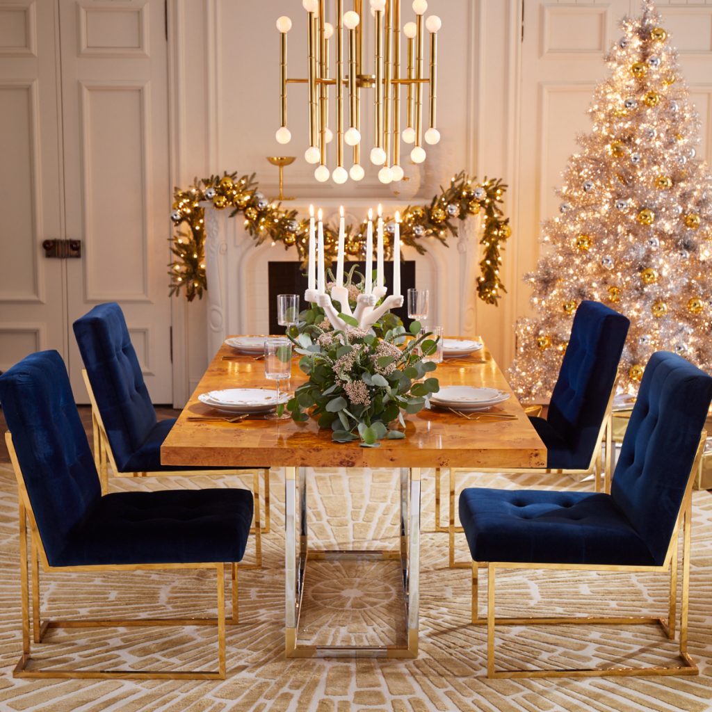 Luxurious Christmas tablescape with grand foliage
