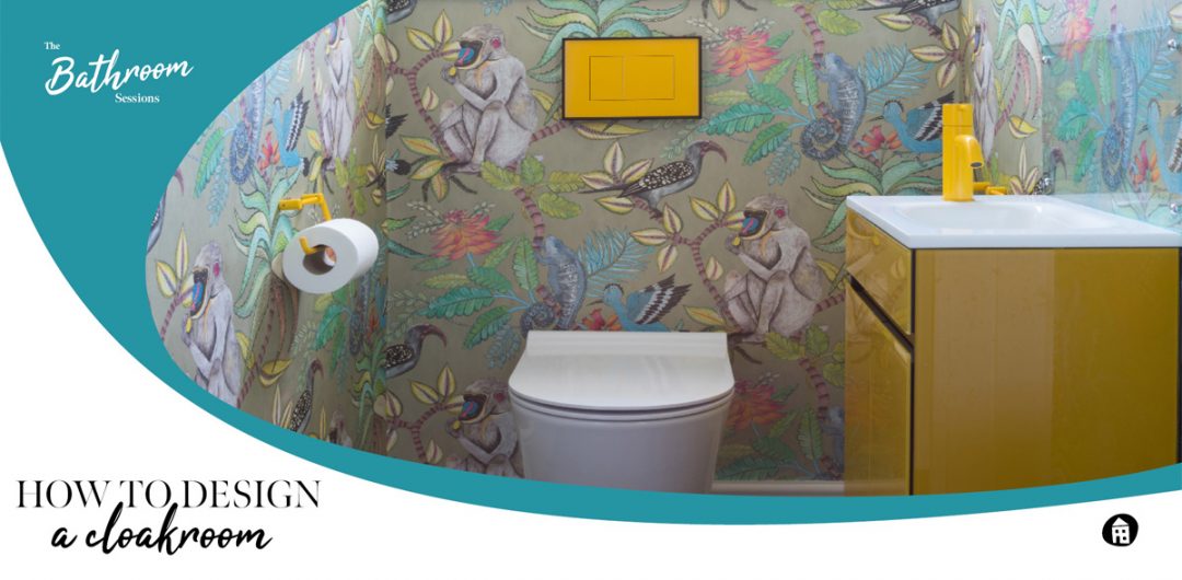 how to design a cloakroom such as this loo featuring floral wallpaper and a yellow flush button