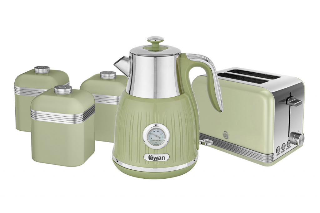 a pastel green kettle and toaster set with three matching pots