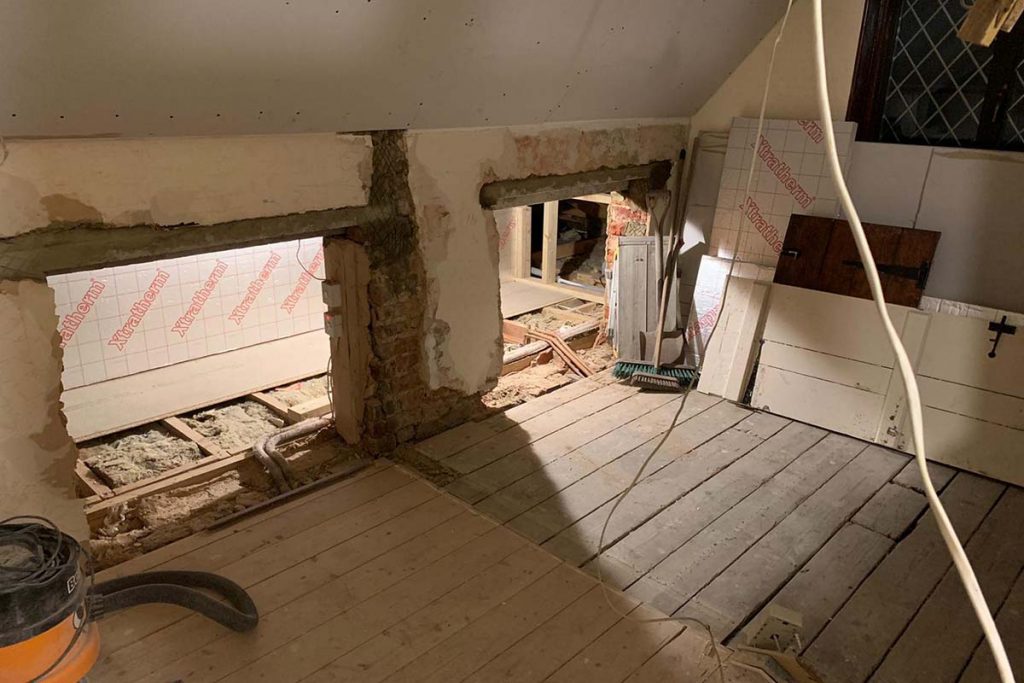 stripped floorboards under eaves