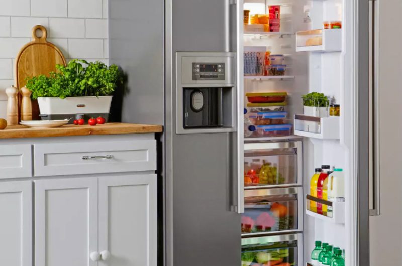 a large American-style fridge freezer containing lots of food and drinks