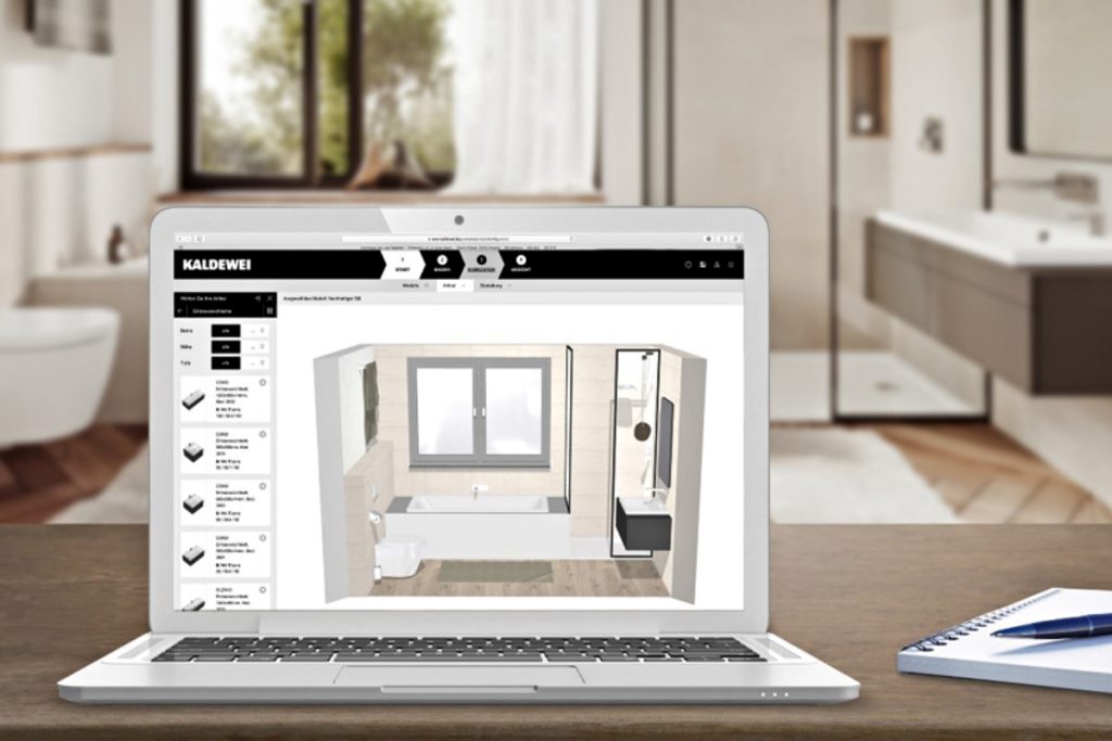 a laptop on a wooden table in a beautiful room, displaying Kaldewei's online planner 