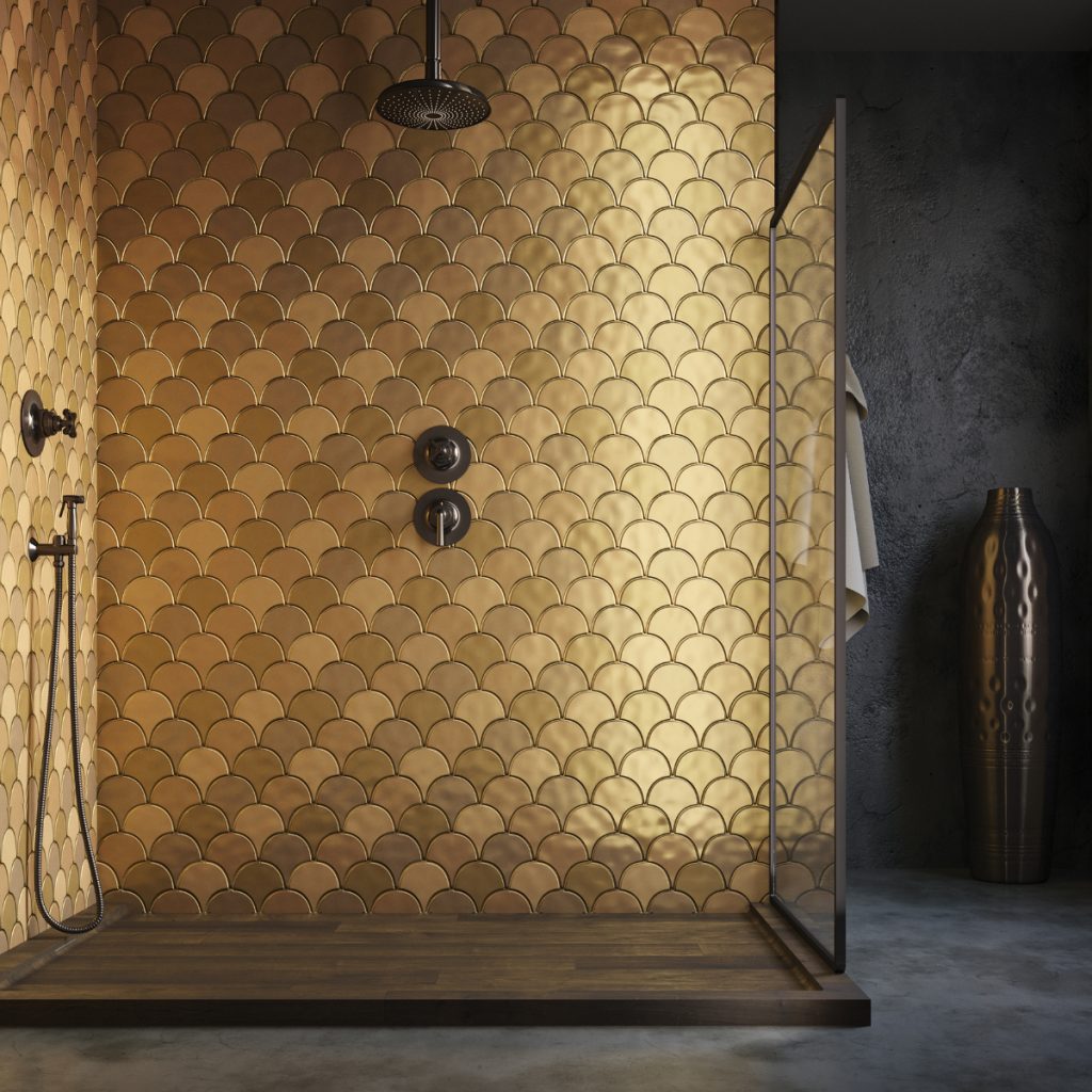 an Art Deco bathroom with gold scallop wall tiles and matt black fixings