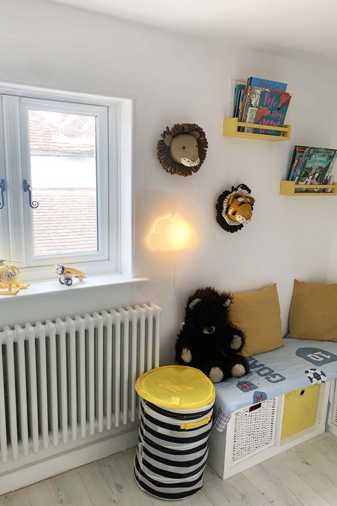 a kids bedroom renovation with cuddly toys, seating and cushions 