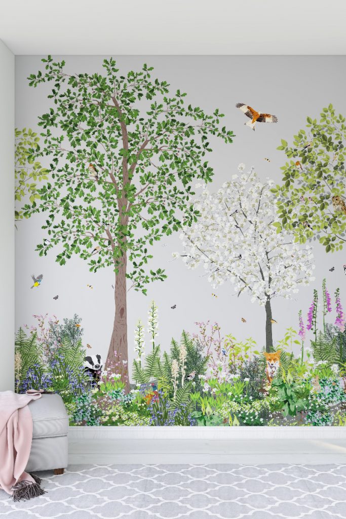 a nature inspired full-length feature wall with trees and flowers