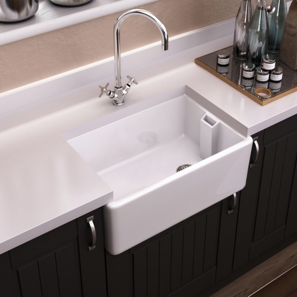 a white Belfast sink with chrome tap