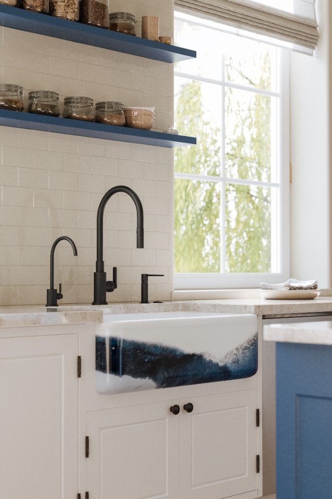 a cream kitchen with matt black tap and fittings and two navy shelves with jars of food on them