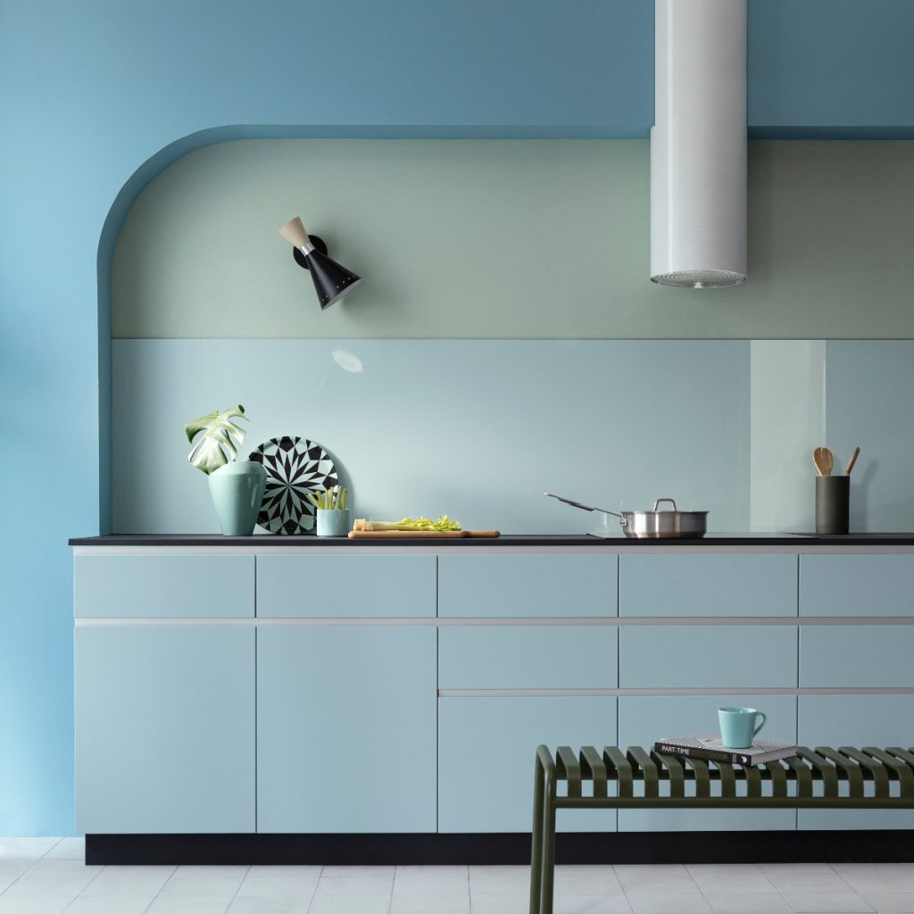 a pale blue handleless kitchen