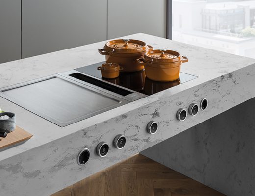 an induction hob with two pans on it