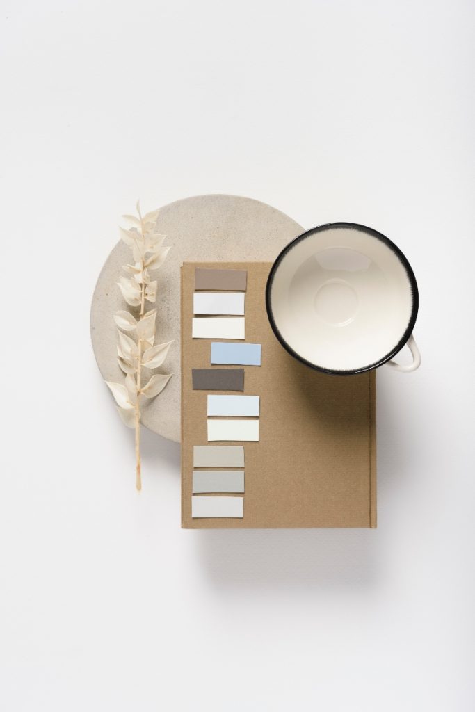 a white, cream and brown minimalist mood board