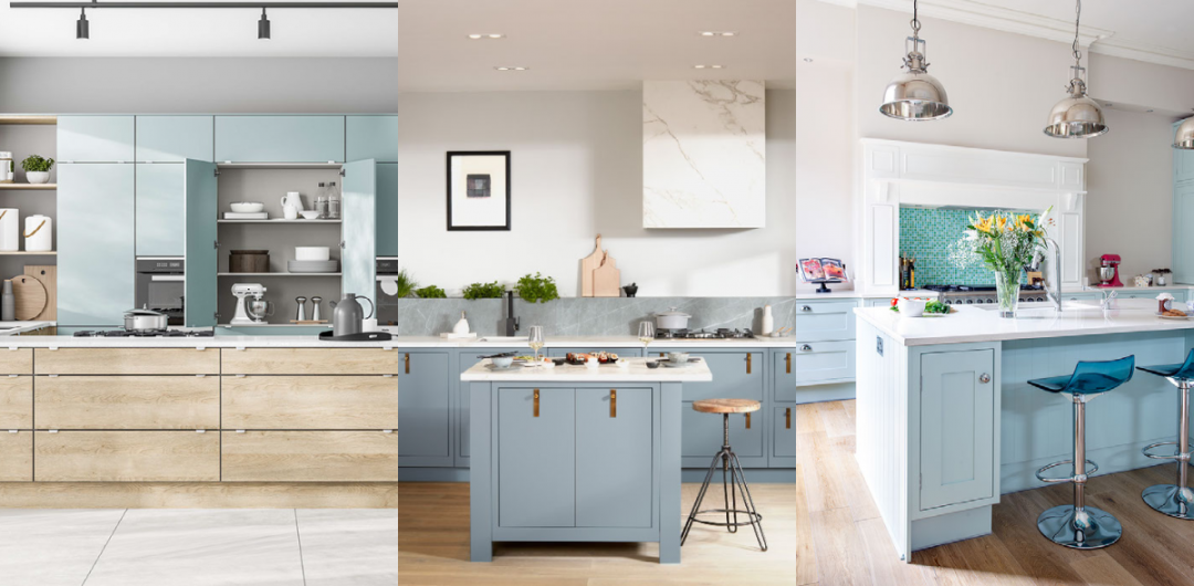 a pale blue kitchen with brass fittings and a central white and blue island