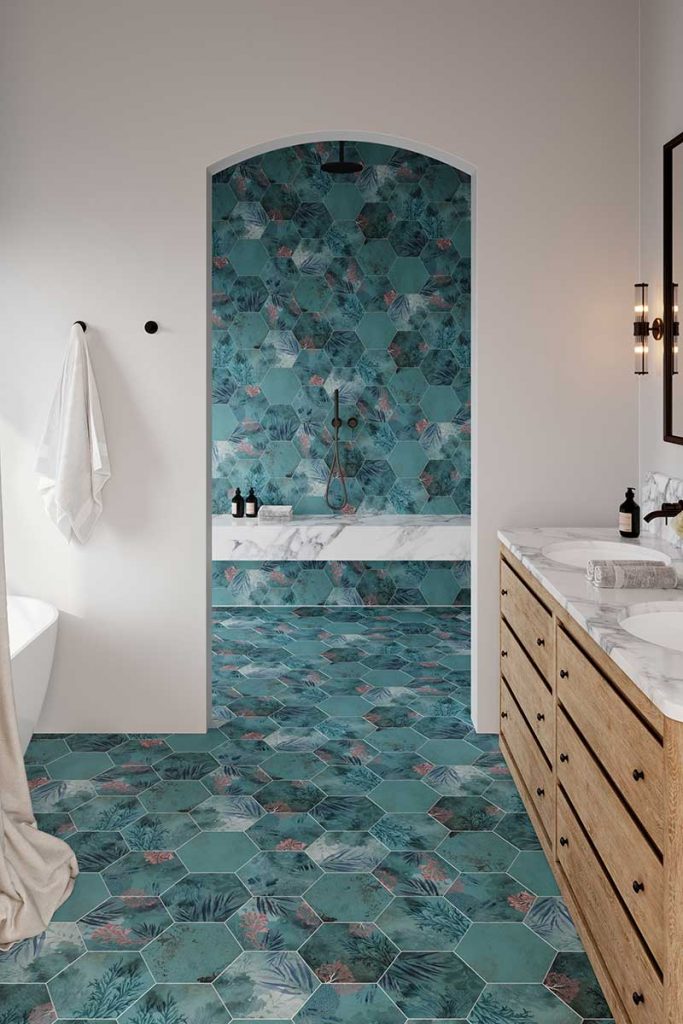 a bathroom featuring pretty aqua hexagonal tiles