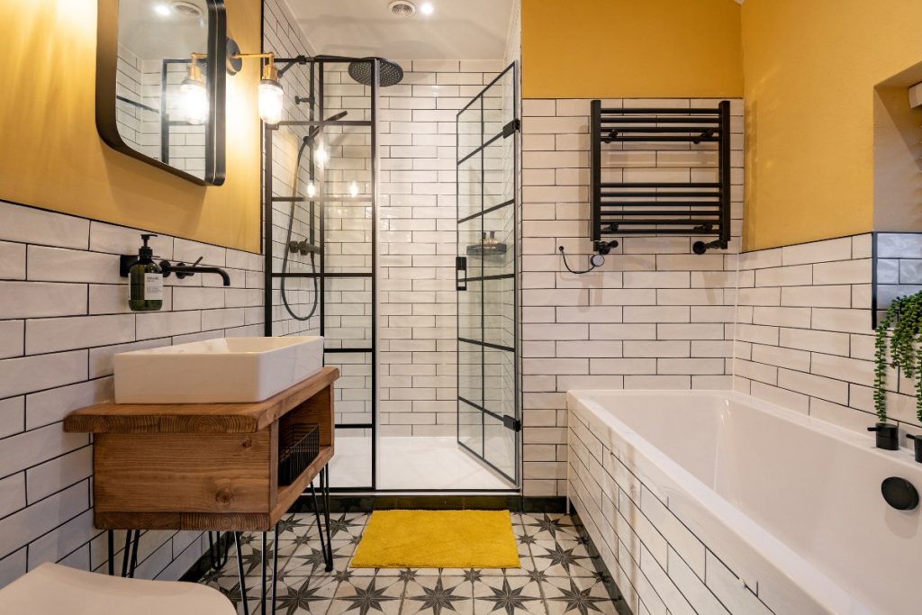 monochrome bathroom with yellow accents